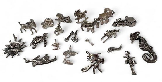 Collection Of Sterling Silver Charms