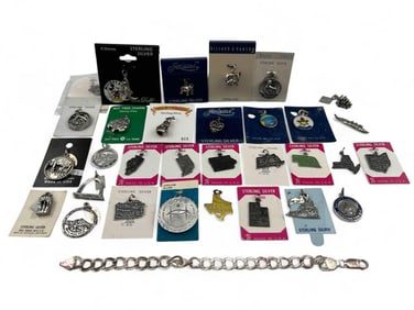 31 Sterling Sliver Charms & Bracelet
