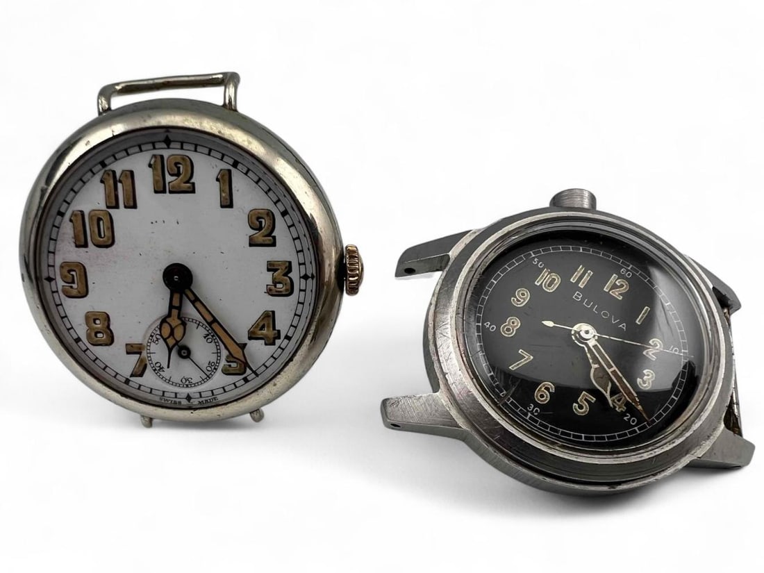 Bulova MIL-W-3818A & Fils de Numa Gagnebin Military Watches: Two Military Wristwatches. Includes Bulova MIL-W-3818A and Fils de Numa Gagnebin World War I Trench Watch. Not running. Please note that case Fils de Numa Gagnebin does not latch closed.