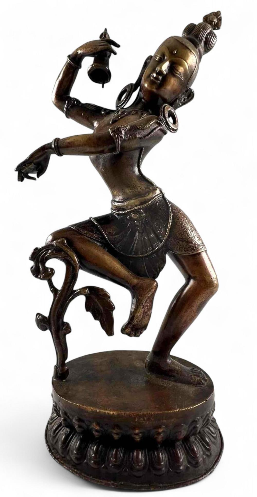Dancing Dakini, Nepalese Bronze Figure: Dancing Dakini, Nepalese Bronze Figure. Approximately 15.125H x 6.25W x 6.625D in.
