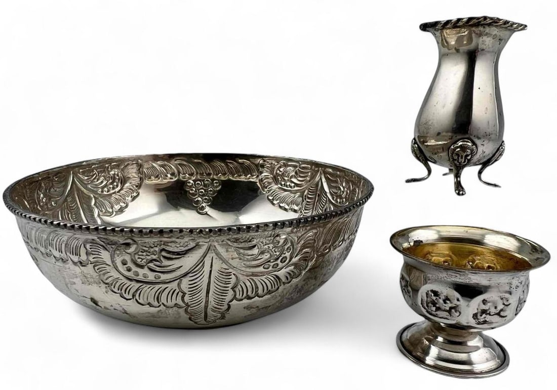 Three Pieces of 800 Silver: Three Pieces of 800 Silver. 132.1g. Largest piece approximately 4.88W x 1.75H in. Smallest piece approximately 1.72W x 1.31H in. ALL CREDIT CARDS WILL BE MANUALLY VERIFIED PRIOR TO SHIPMENT.