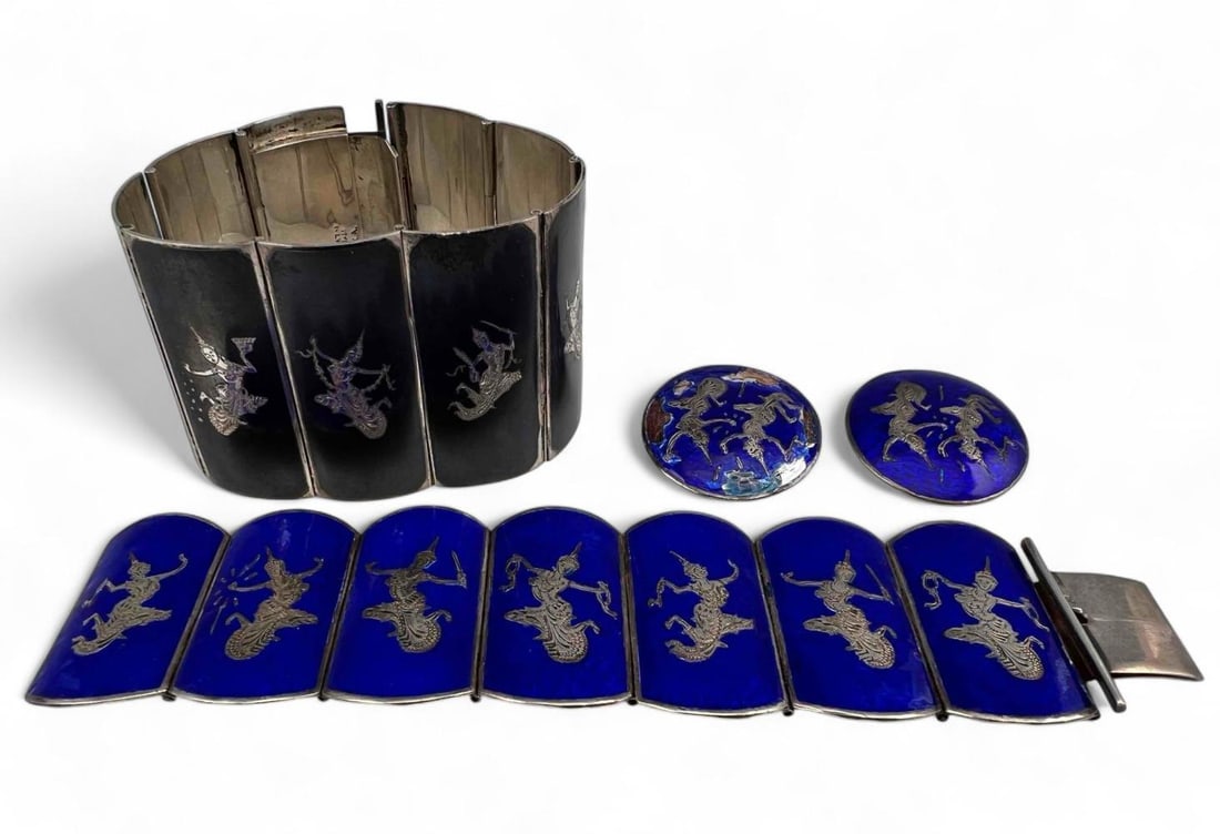 Siam Silver Bracelets & Earrings: Siam Silver Bracelets & Earrings, 155.6g. Marked or test as sterling. Larger bracelet inner circumference approximately 7.0in. Width approximately 1.75in. Smaller bracelet inner circumference approxim