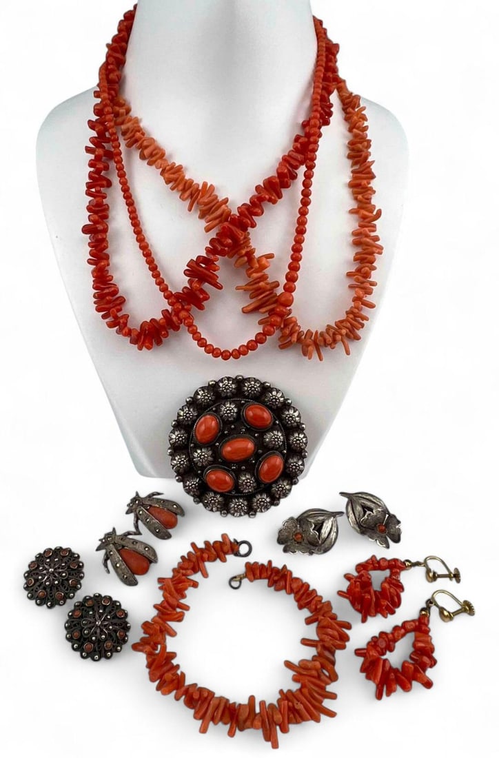 Grouping Of Coral & Silver Jewelry: Grouping Of Coral & Silver Jewelry. Silver pieces marked or test as 800 silver, 51.4g. Longest coral bead necklace approximately 17.0in. Branch coral bracelet length approximately 7.7.25in. Widest poi