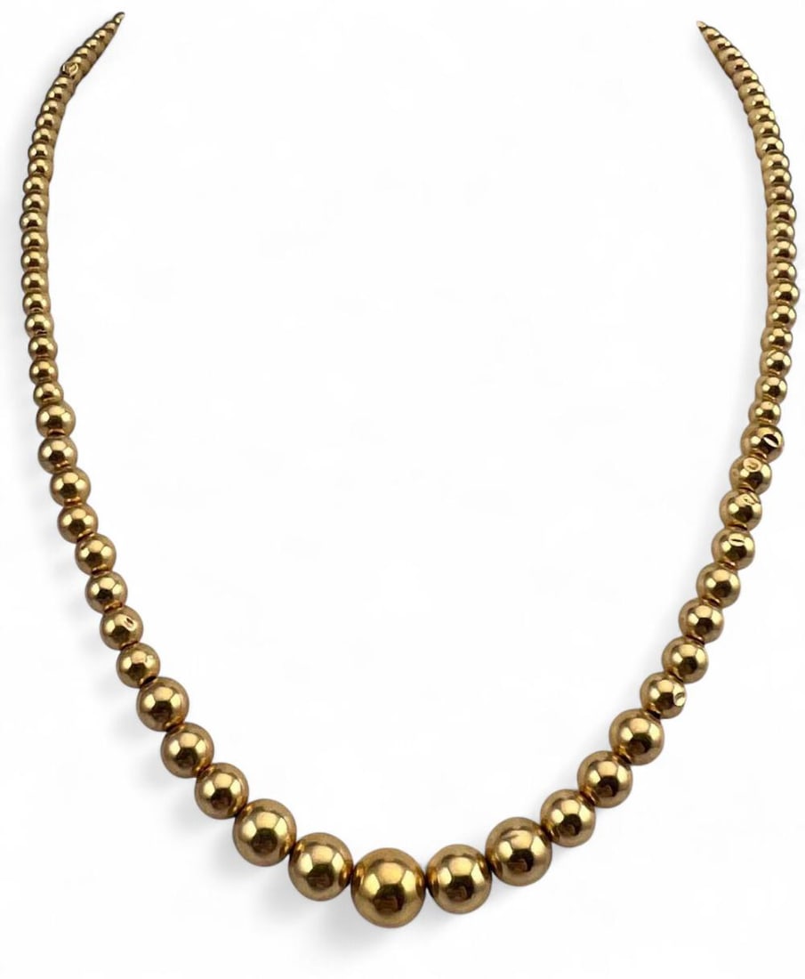 14K Yellow Gold Graduated Bead Necklace: 14K Yellow Gold Graduated Bead Necklace, 4.2g. Marked "585." Length approximately 17.0in. Largest bead approximately 7.7mm. ALL CREDIT CARDS WILL BE MANUALLY VERIFIED PRIOR TO SHIPMENT.