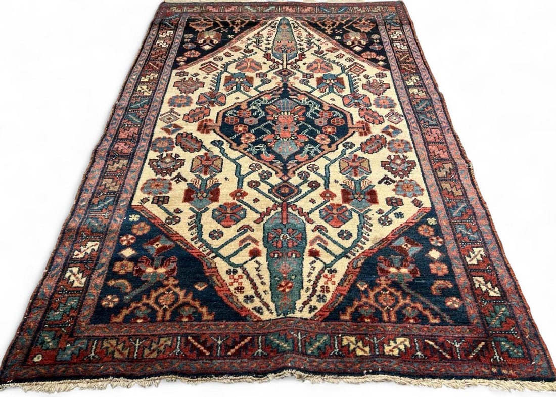 Persian Rug With Stylized Floral Motif On Cream Ground, Mid 20th Century: Persian Rug With Stylized Floral Motif On Cream Ground, Ca. Mid 20th Century. Approximately 6.6L x 4.25W ft. (80.0L x 51.5W inches).
