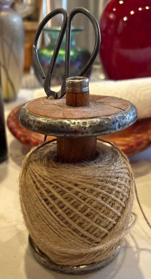 Jute Twine Dispenser With Scissors: Jute twine dispenser with scissors.