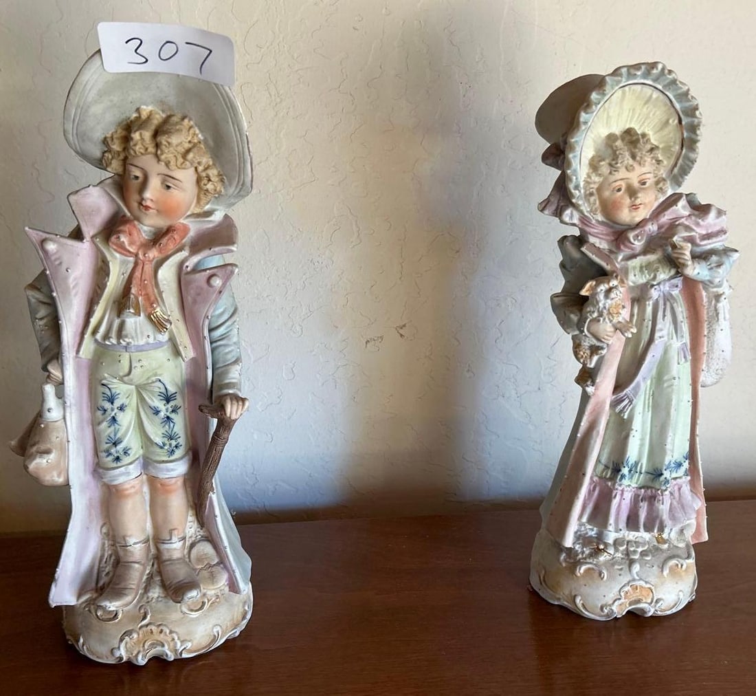 Porcelain Bisque Figure Pair: Porcelain bisque figure pair.