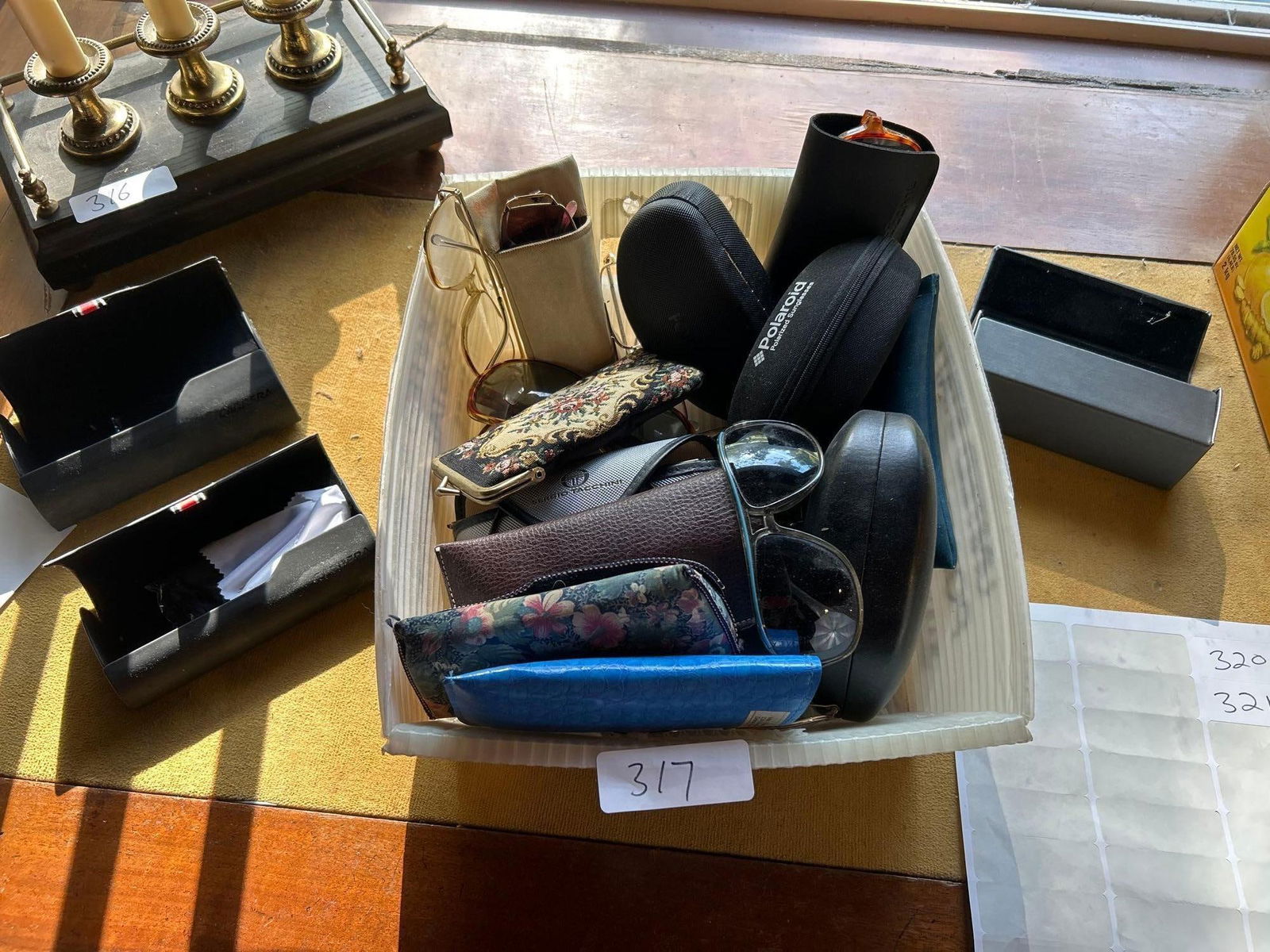 Grouping Of Glasses And Glasses Cases: Grouping of glasses and glasses cases.