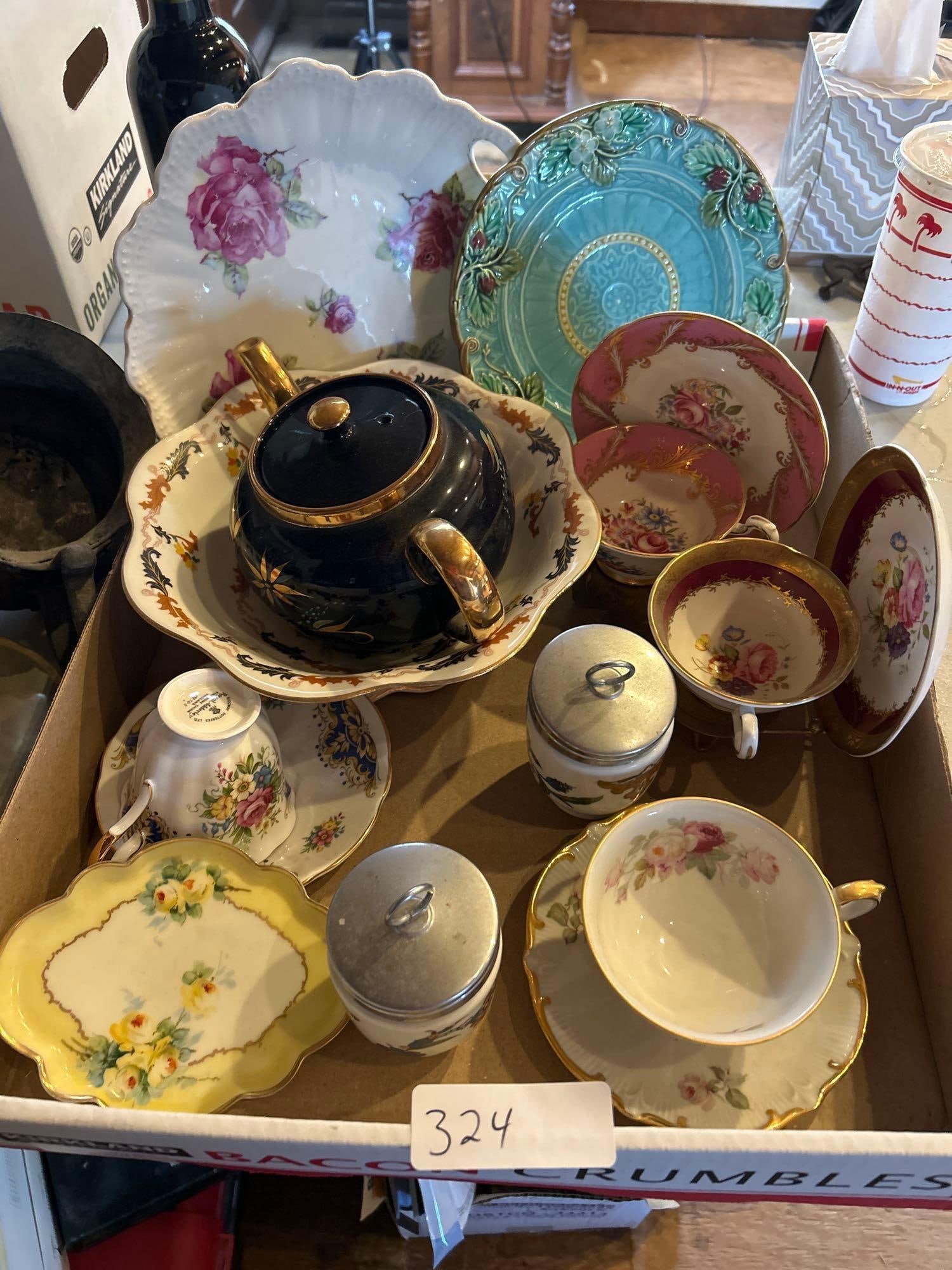 Tray Of Porcelain Tea Cups, Platters, Teapot, And Majolica: Tray of porcelain tea cups, platters, teapot, and Majolica.