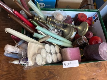 Box Of Candles And Brass Candlesticks