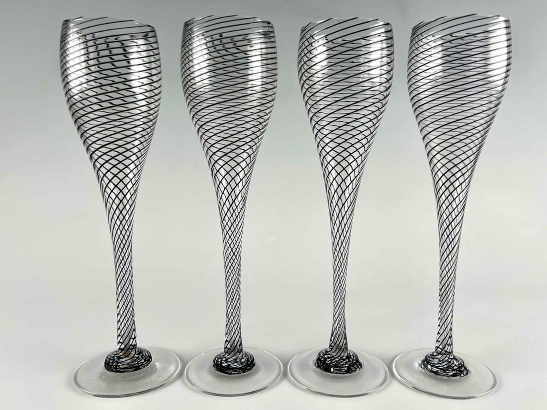 Set of Four Steven Maslach Lattice Striped Art Glass Stemmed Glasses or Flutes: Set of Four Steven Maslach Lattice Striped Art Glass Stemmed Glasses or Flutes. Approximately 2.875D x 9.50H in.FOR SHIPPING: You may reach out to: QPS info@qualitypackship.com www.qualitypackship.com