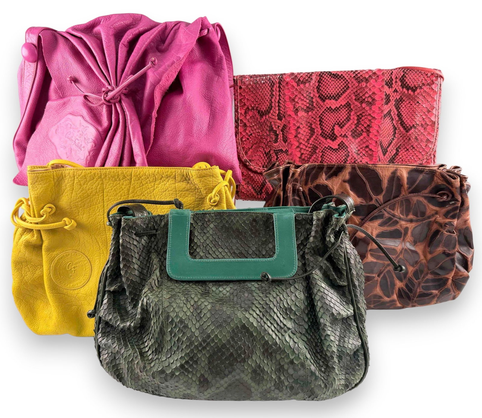 Collection Of Vintage Carlos Falchi Leather & Reptile Skin Purses: Collection Of Vintage Carlos Falchi Leather & Reptile Skin Purses. Largest approximately 17.0W x 11.0H x 4.0D in. Smallest approximately 14.0W x 9.5H x 2.5D in.FOR SHIPPING: You may reach out to: QPS 