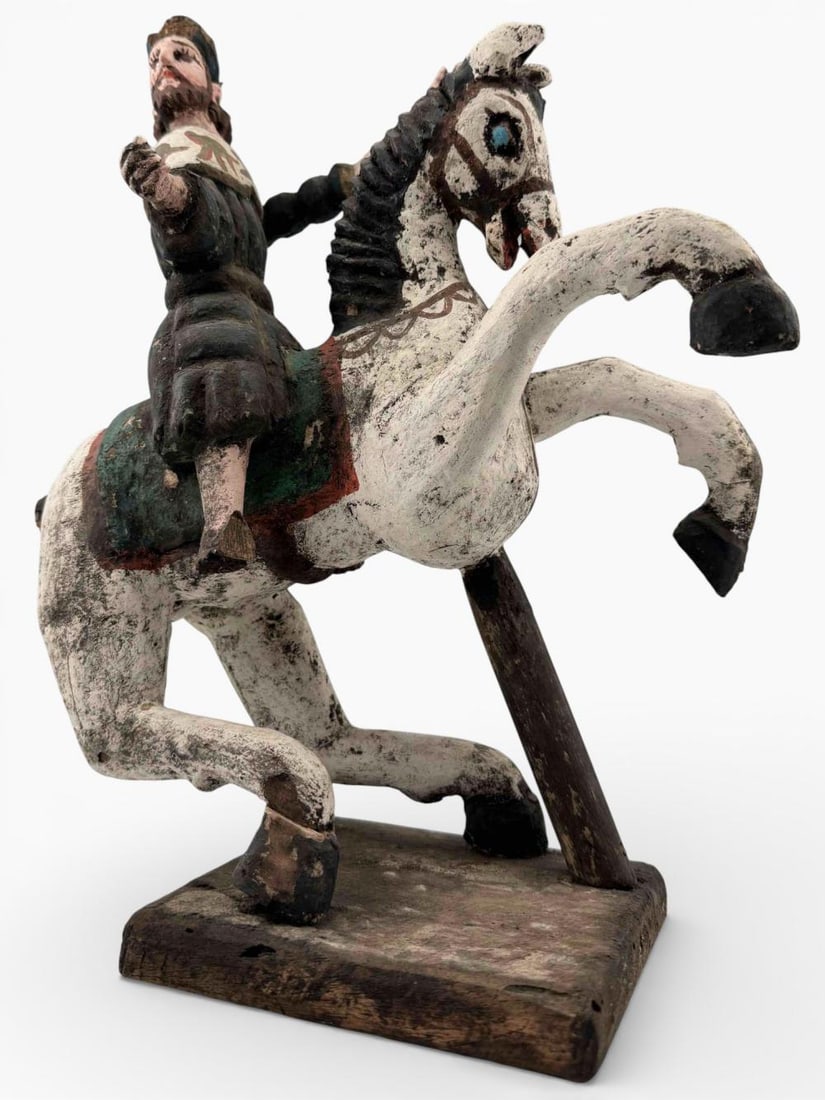 Santiago Matamoros (St. James Moor Slayer) Latin American Folk Religious Sculpture: Santiago Matamoros (St. James Moor Slayer) Latin American Folk Religious Sculpture. Hand-carved wood figure with polychrome decoration and painted eyes. Approximately 14.625H x 10.25L x 6.5W in.