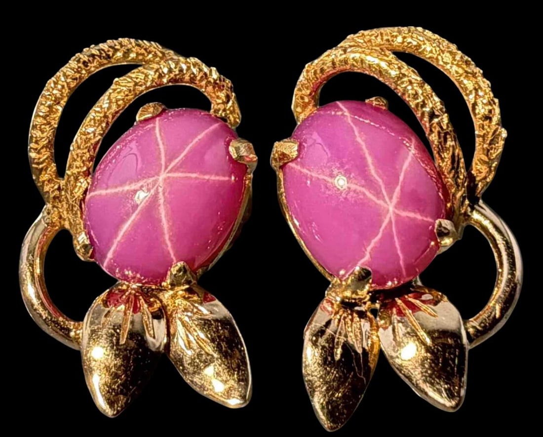 14K Pink Star Sapphire Earrings: 14K Pink Star Sapphire Earrings, 4.3g. Marked 14K. Signed Illegibly. Approximately 16.7 x 9.9mm. Sapphires approximately 7.6 x 6.0mm. ALL CREDIT CARDS WILL BE MANUALLY VERIFIED PRIOR TO SHIPMENT.