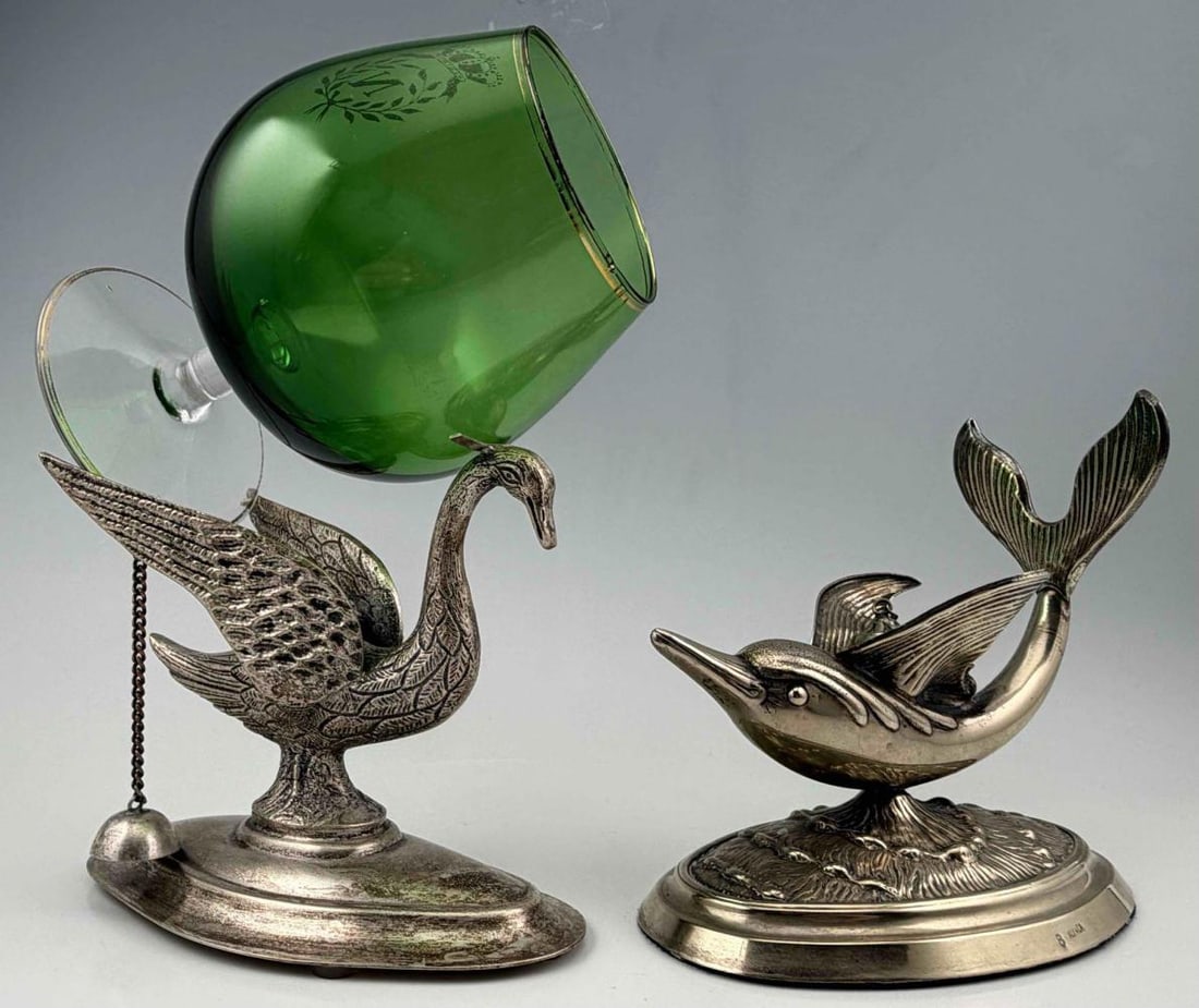 Two Alpaca Silver Figural Swan & Dolphin Brandy Warmers: Two Alpaca Silver Figural Swan & Dolphin Brandy Warmers. Marked "Alpaca." Approximately 4.5H x 5.5L x 3.125W in. and 5.0H x 5.5L x 3.125W in.