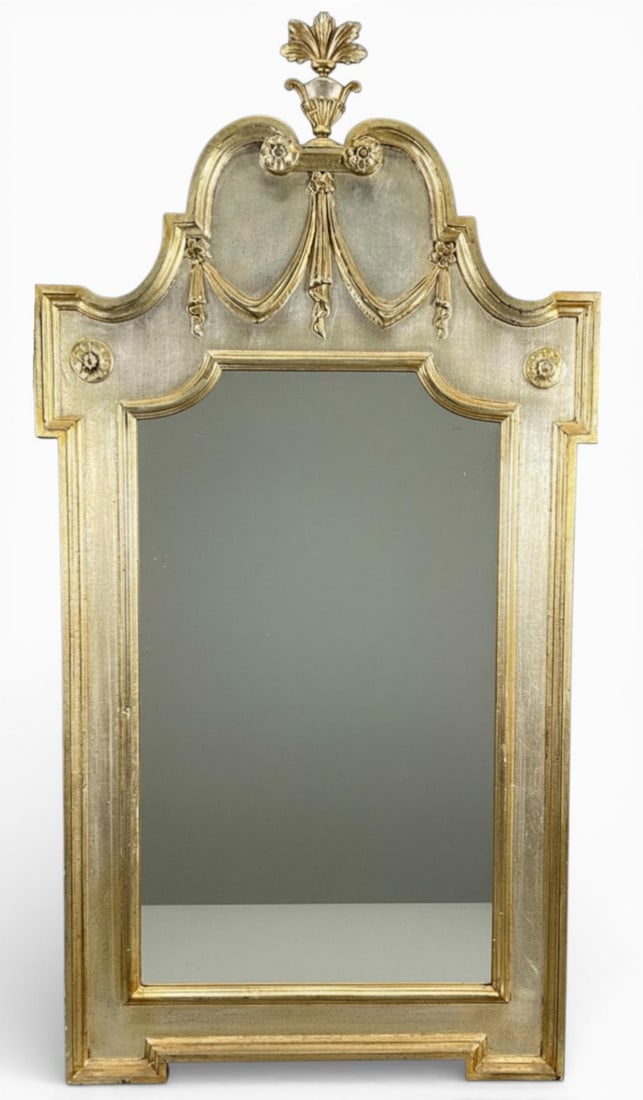 Italian Hollywood Regency Wall Mirror, Mid-20th Century: Italian Hollywood Regency wall mirror, mid-20th century. Label on verso marked "Made in Italy." Approximately 57.0H x 29.875W x 1.375D in.