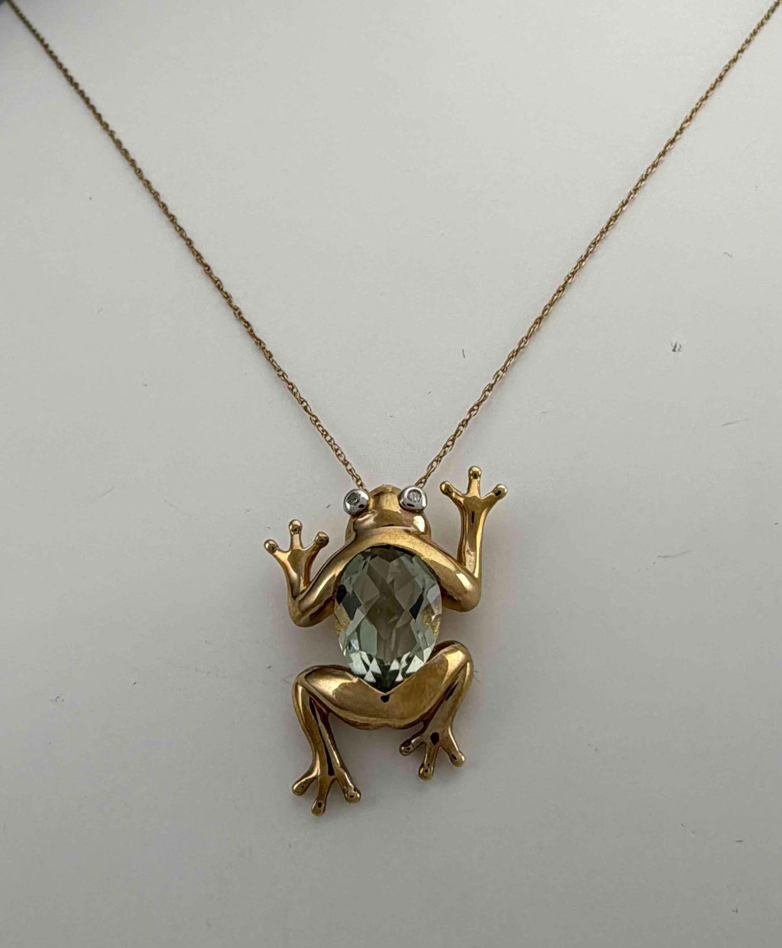 10K Topaz Diamond Frog Necklace: 10K Topaz Diamond Frog Necklace, 2.9g. Pendant approximately 19.7 x 17.2 mm. Topaz approximately 8.6 x 6.7mm. ALL CREDIT CARDS WILL BE MANUALLY VERIFIED PRIOR TO SHIPMENT.