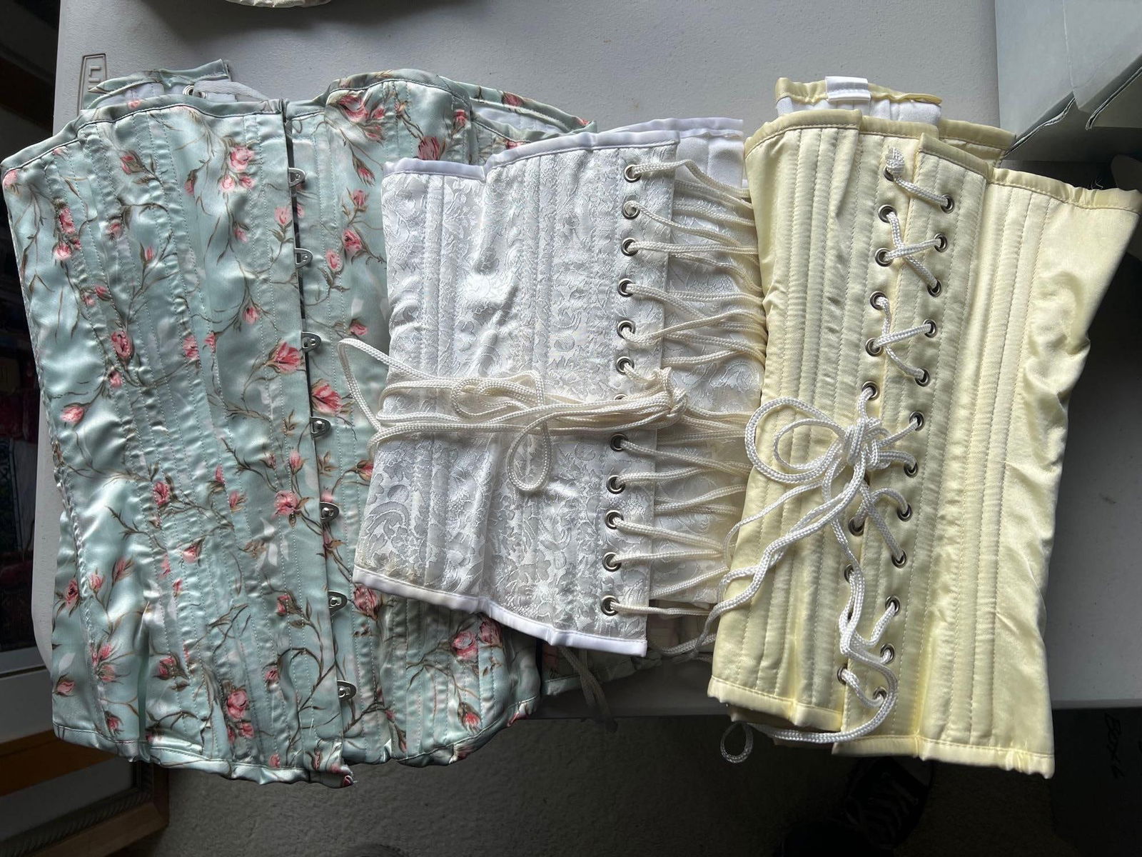 Three Lace Up Corsets: Three lace up corsets. Size 28.
