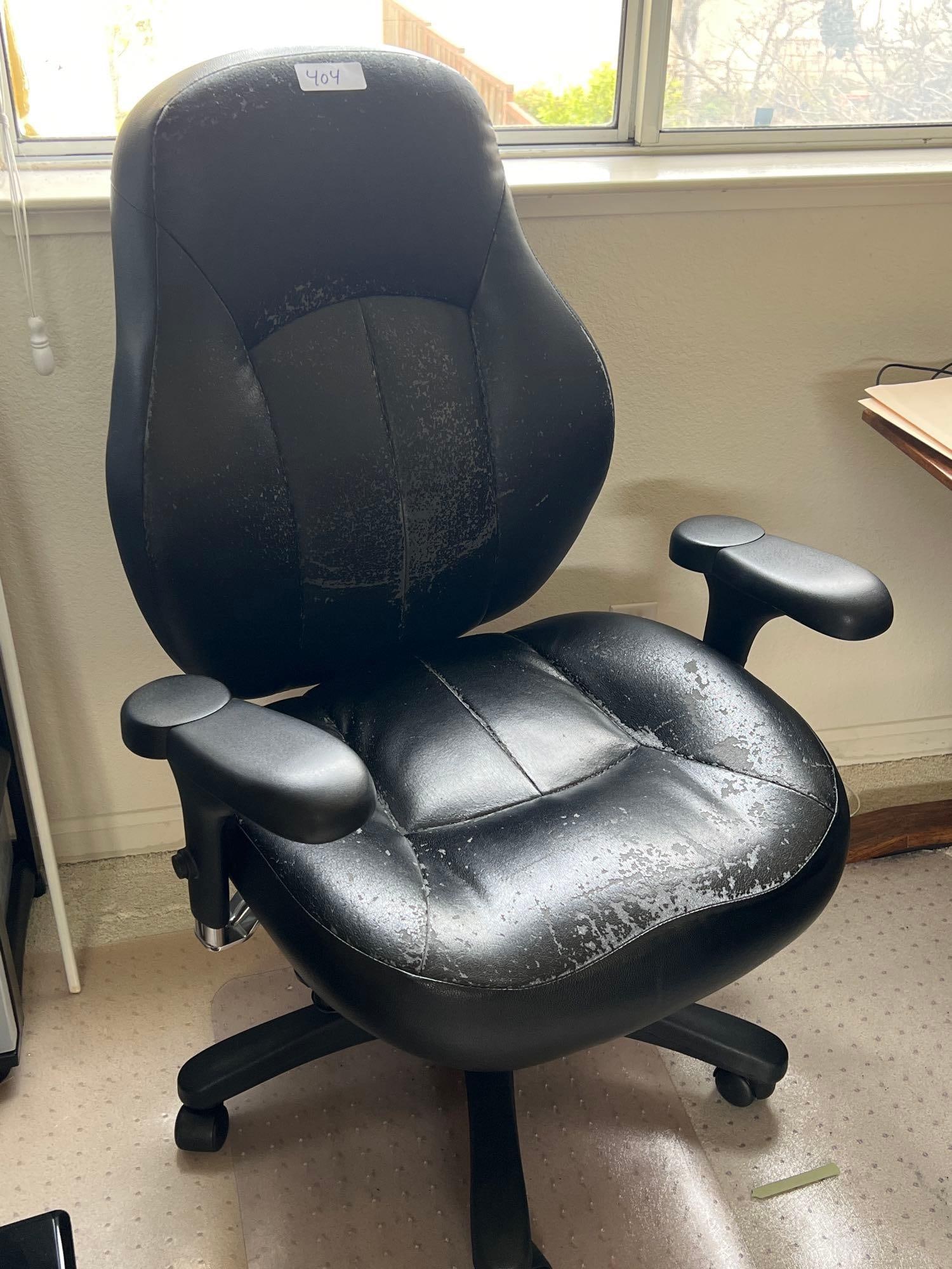 Rolling Office Chair: Rolling office chair.