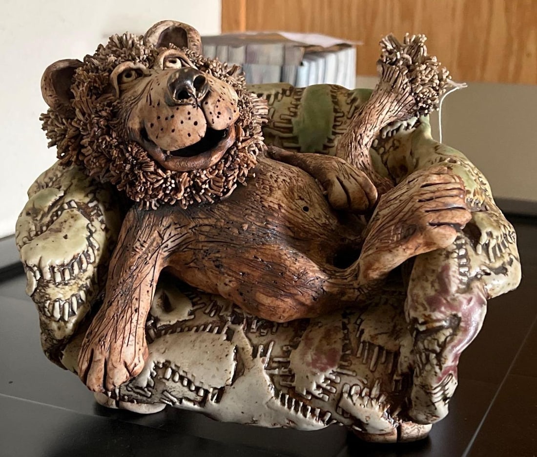 Wild Earth Pottery Lion Sculpture: Wild Earth pottery lion sculpture.