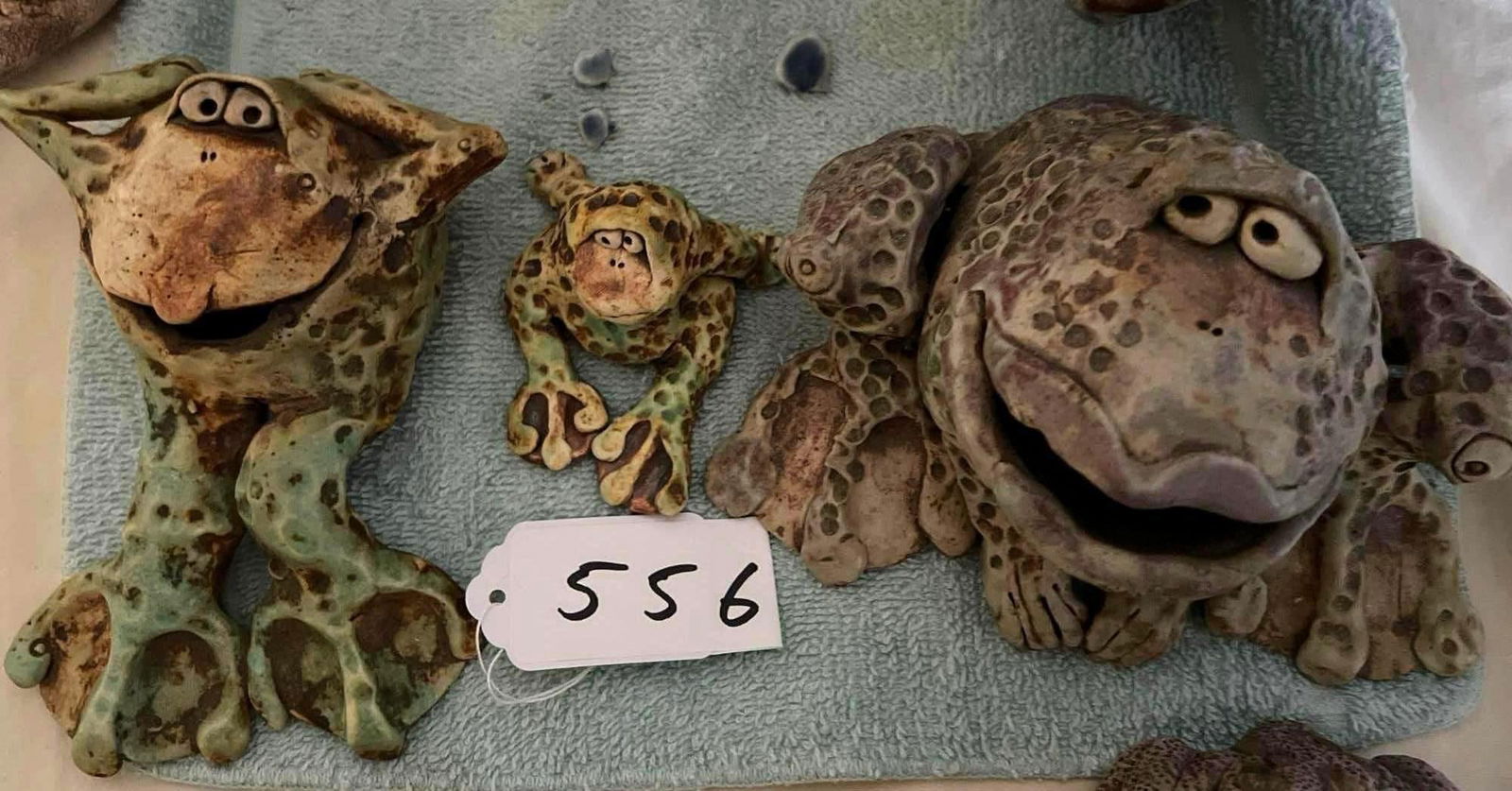 Three Wild Earth Ceramic Frog Sculptures: Three Wild Earth Ceramic Frog Sculptures.