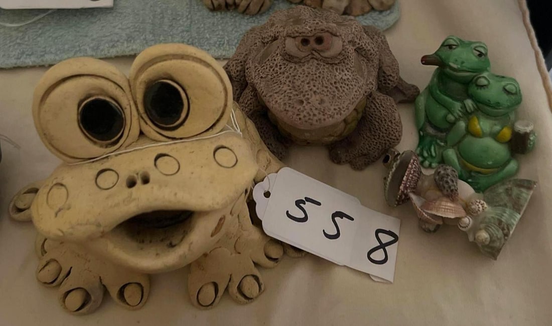 Four Frog Figures: Four Frog Figures.