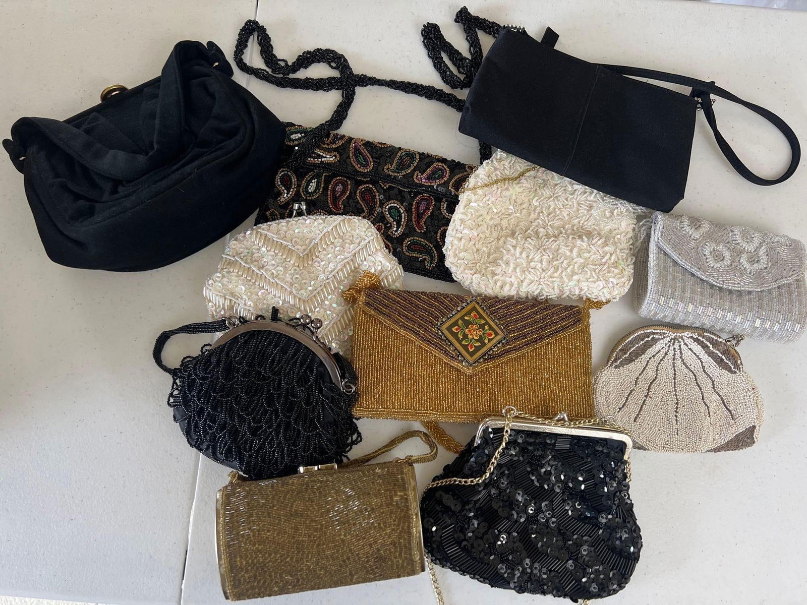 Large Grouping Of Vintage Sequined & Beaded Handbags & Belts: Large Grouping of Vintage Sequined & Beaded Handbags & Belts.