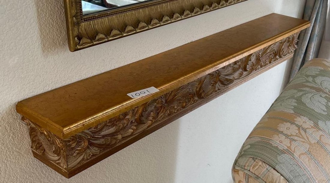 Gold Colored Wooden Wall Shelf: Gold colored wooden wall shelf.