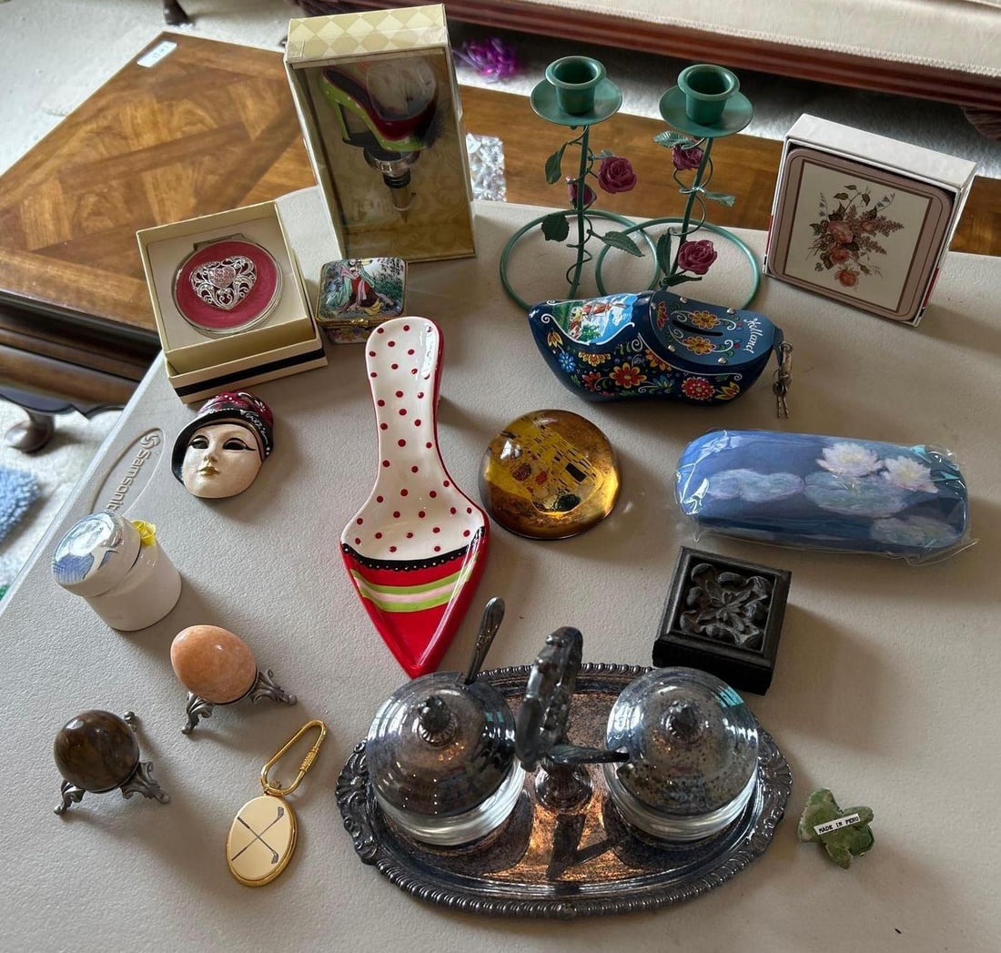Box Of Decorative Household Items, Including Natural Stone Eggs, Compact, Candlesticks, And More: Box of decorative household items, including natural stone eggs, compact, candlesticks, and more.