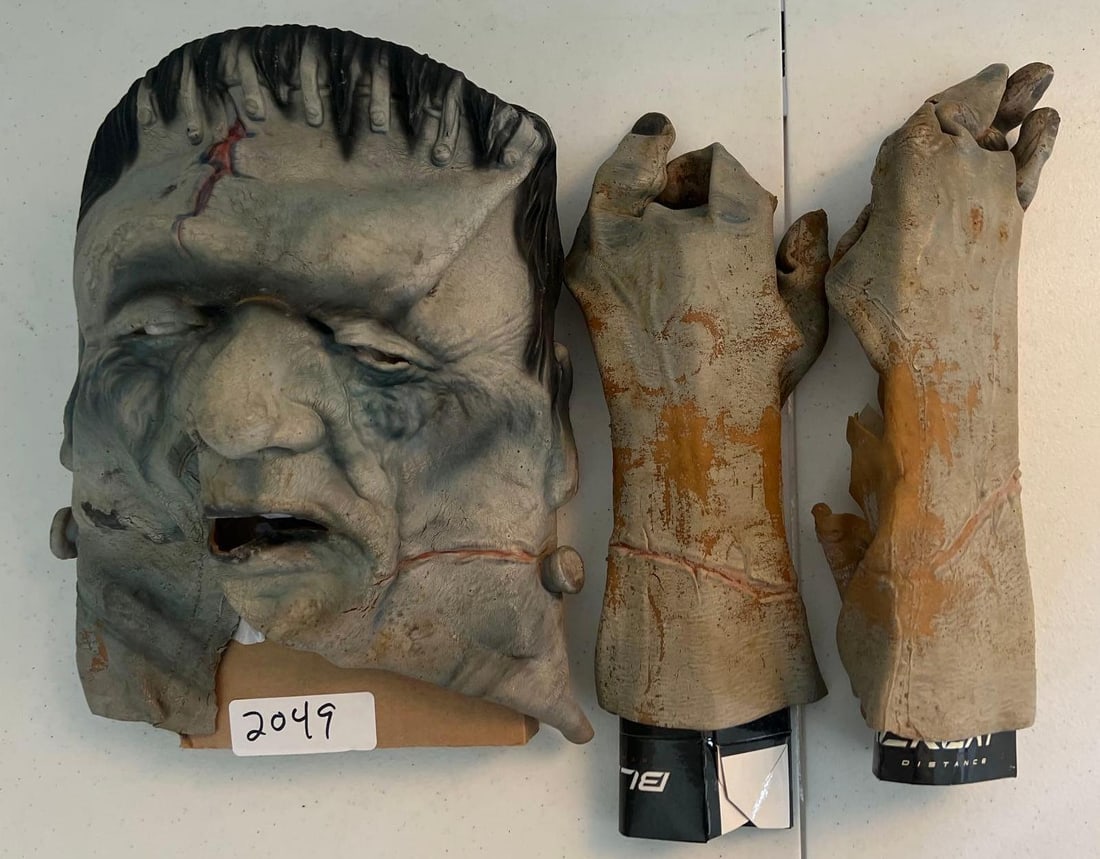 Frankenstein Halloween Mask With Hands: Frankenstein Halloween mask with hands.