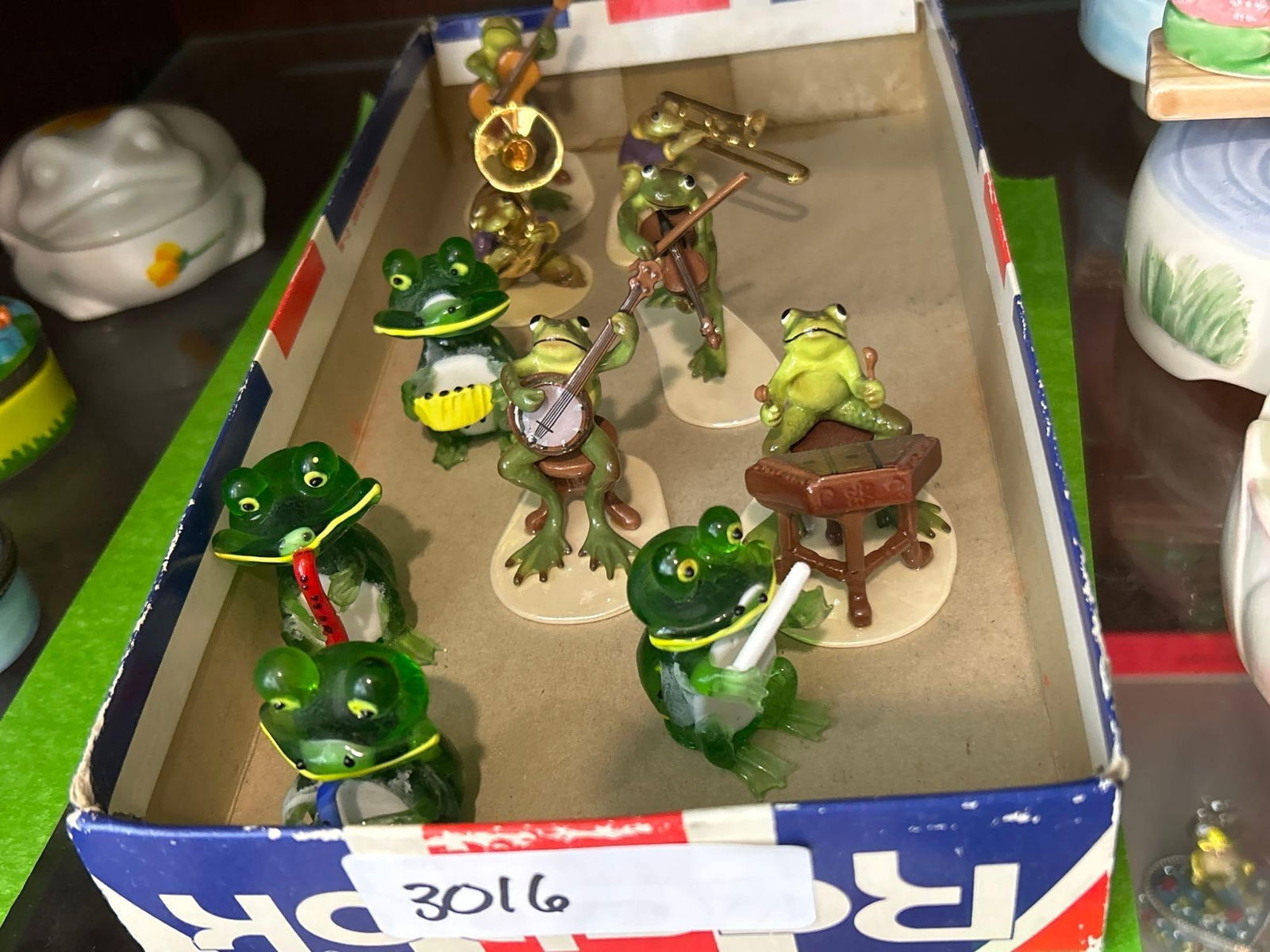 Miniature Porcelain & Art Glass Frog Musician Figures: Miniature porcelain & art glass frog musician figures.