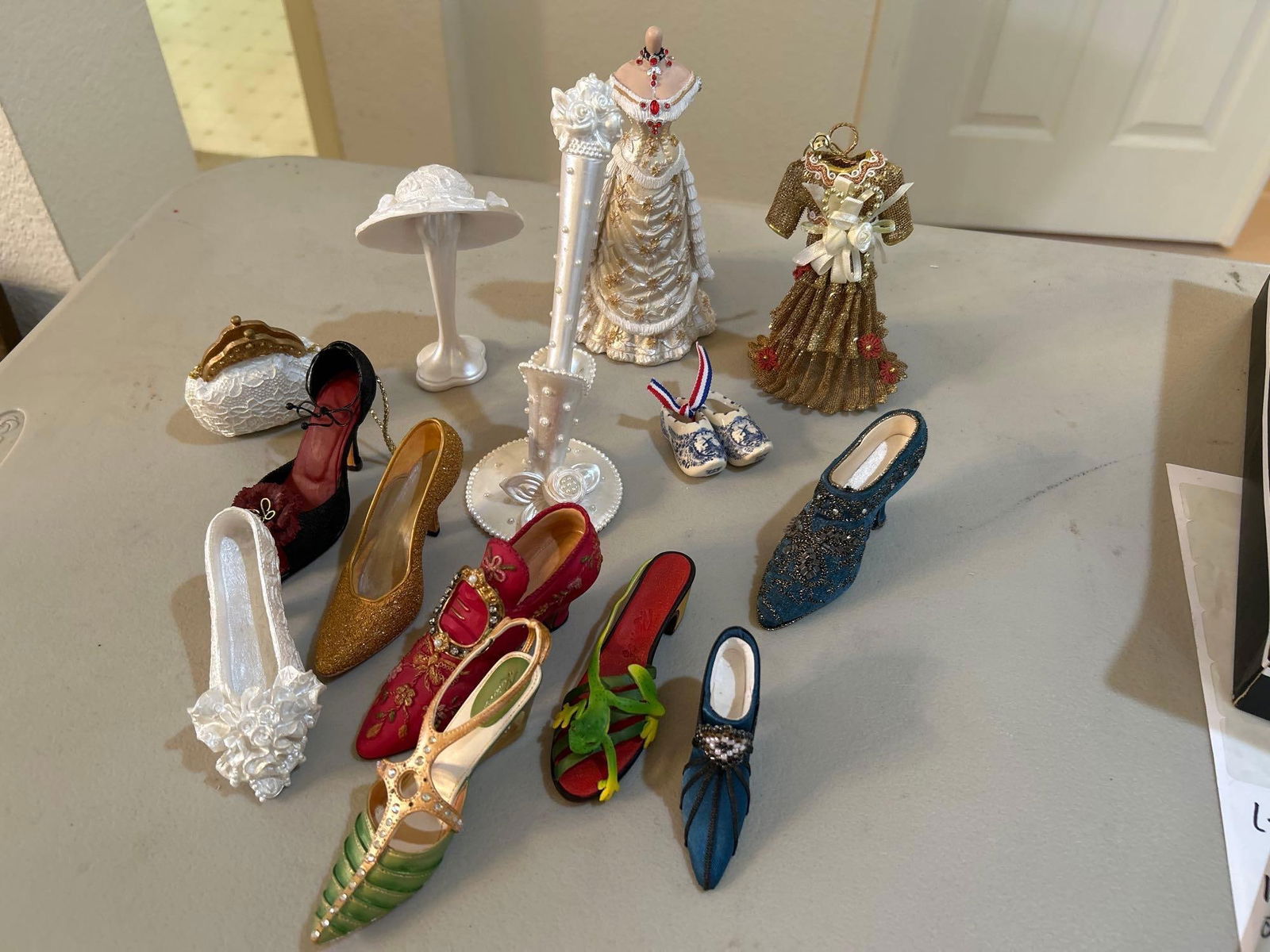Miniature Shoes & Collectibles: Miniature shoes & collectibles.