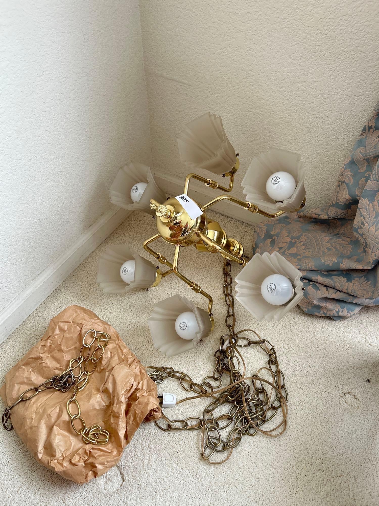 Brass Six Light Chandelier: Brass six light chandelier.