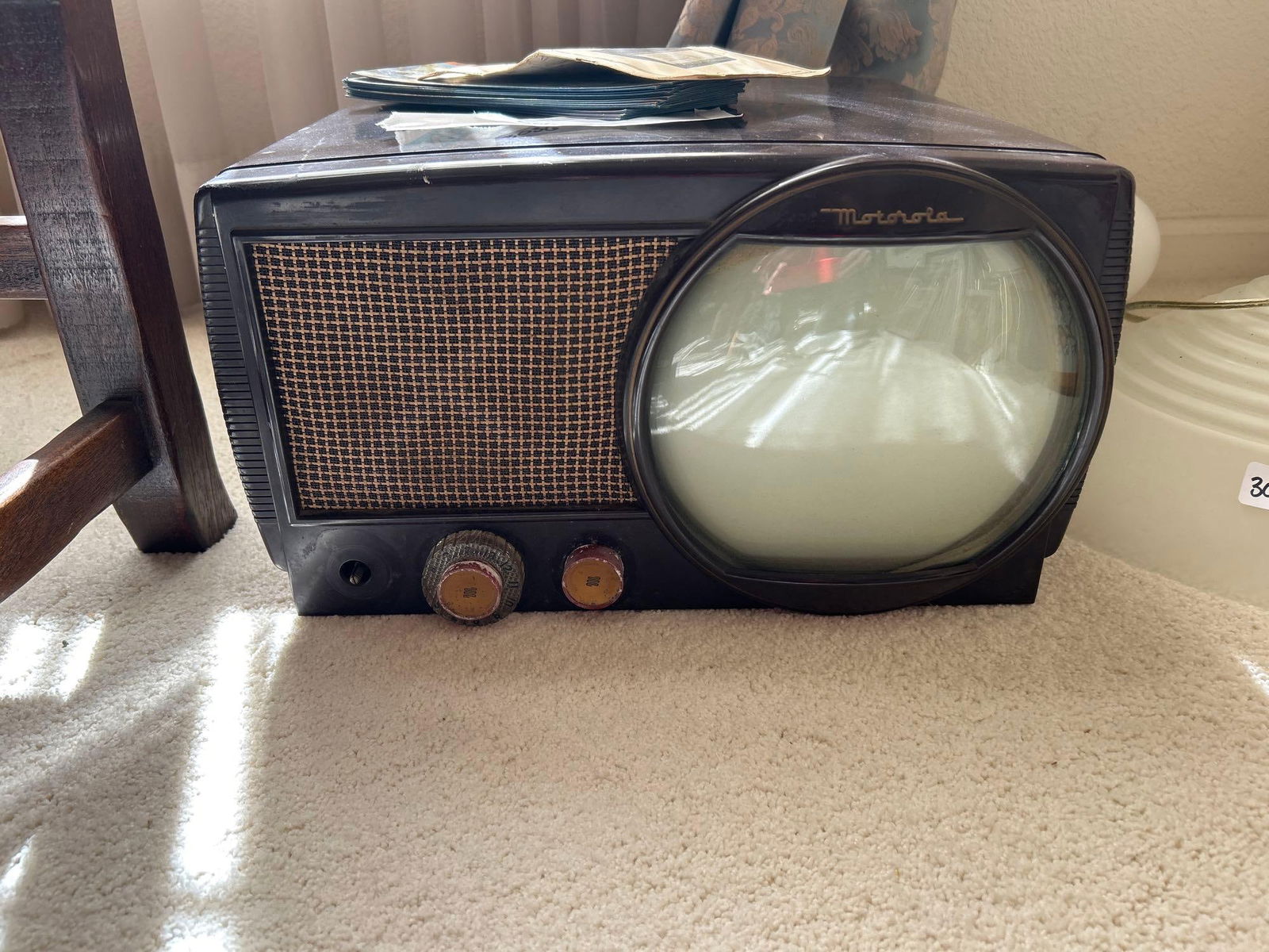 1940s Motorola Bakelite Television: 1940s Motorola Bakelite television. Approximately 16.0W x 9.25H x 17.0D in, with original paperwork and advertising