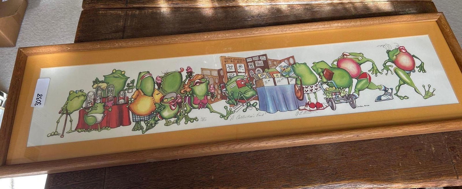 Pencil Signed Frog Print: Pencil signed frog print. Approximately 38.75W x 11.0H in, as framed.