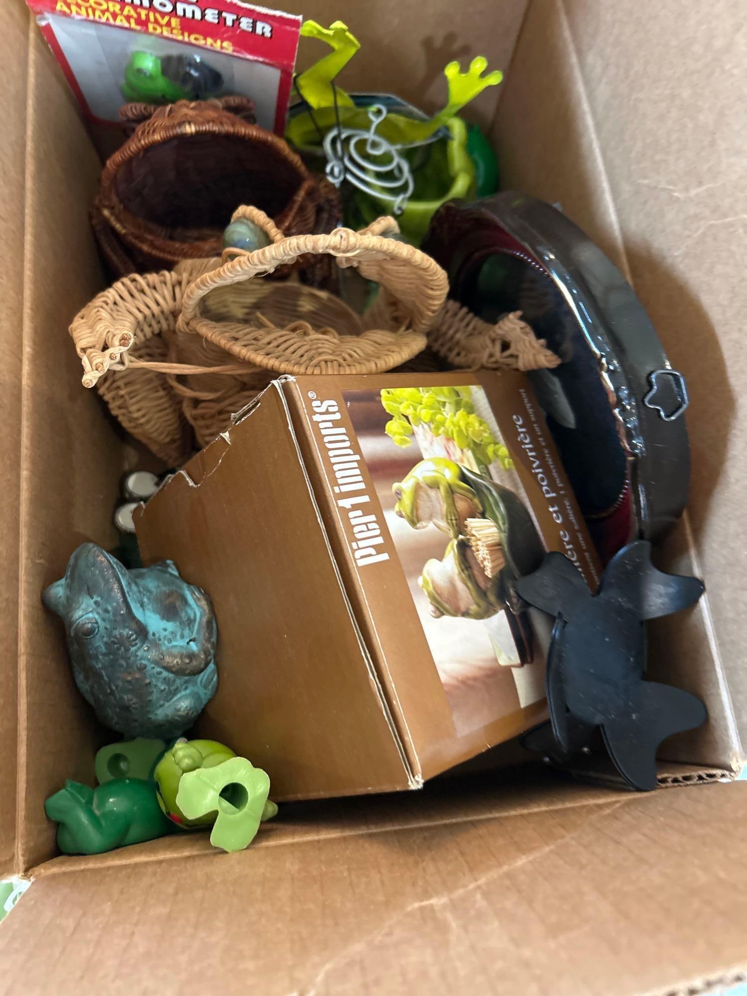Box Of Frog Collectibles To Include Wicker, Pottery, Wind Chime, And More: Box of frog collectibles to include wicker, pottery, Wind chime, and more.