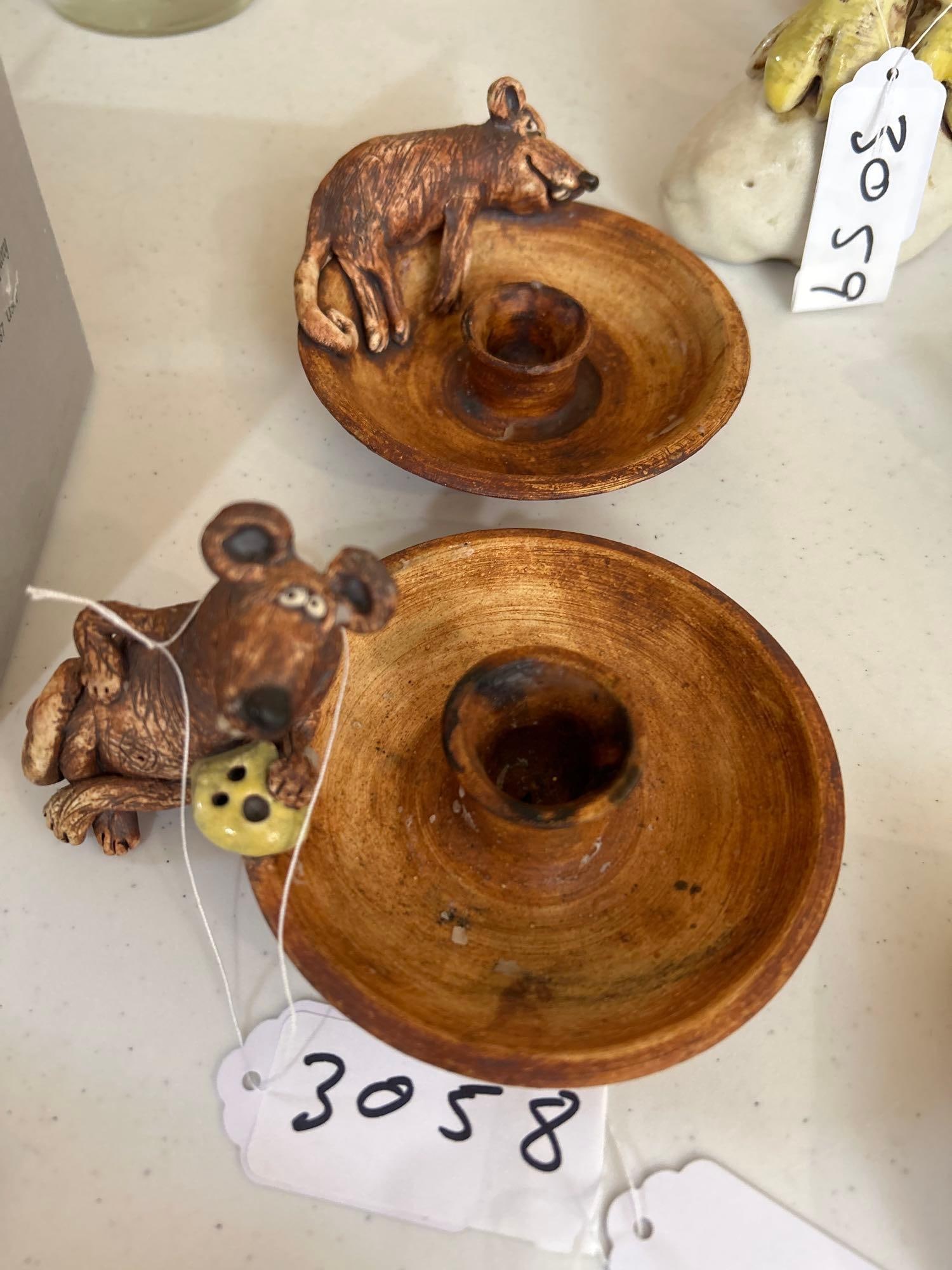 Two Wild Earth Pottery Mouse Candleholders: Two Wild earth pottery mouse candleholders.