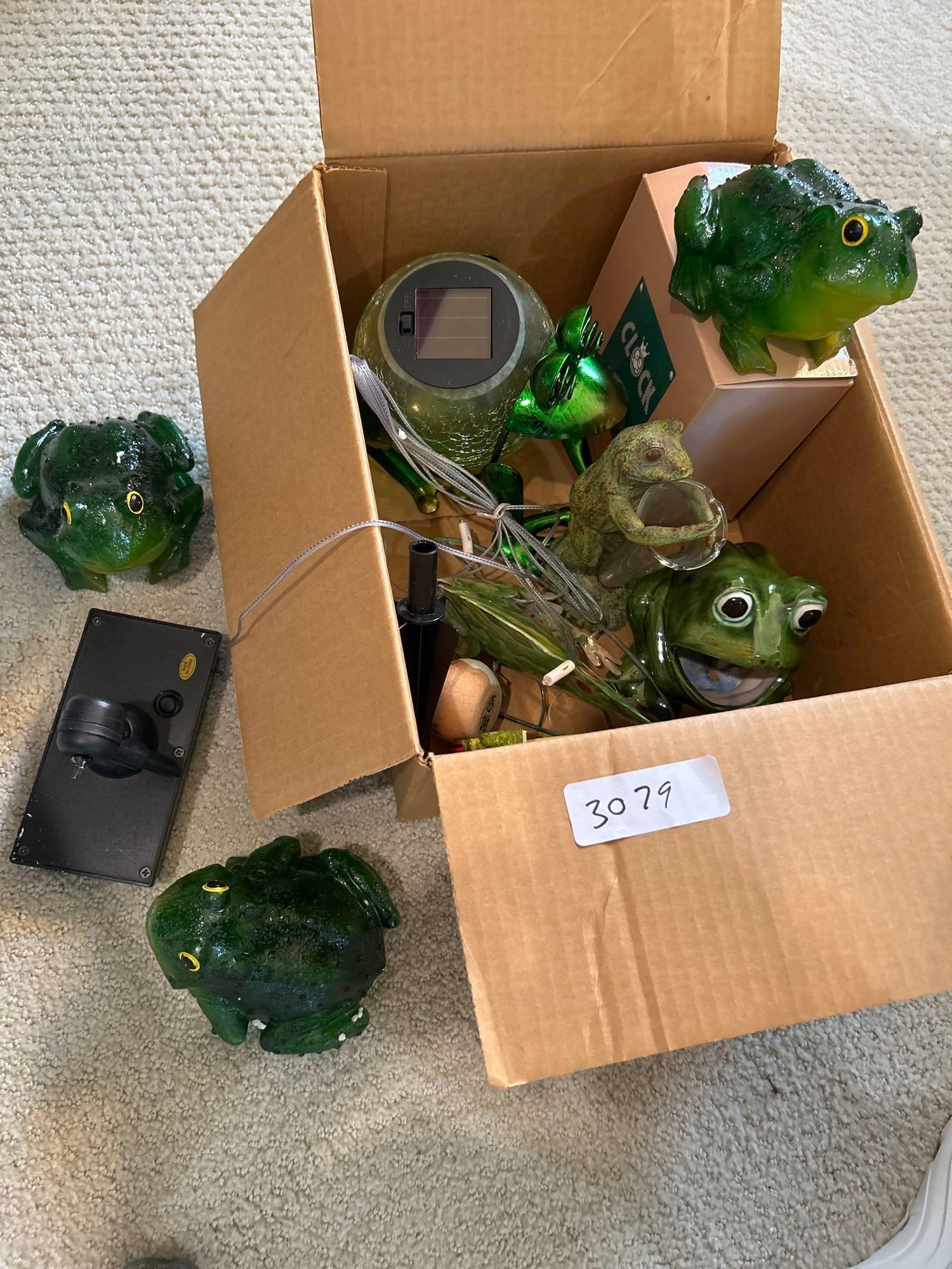 Box Of Frog Themed Items, Including Solar Garden Lights: Box of frog themed items, including solar garden lights.