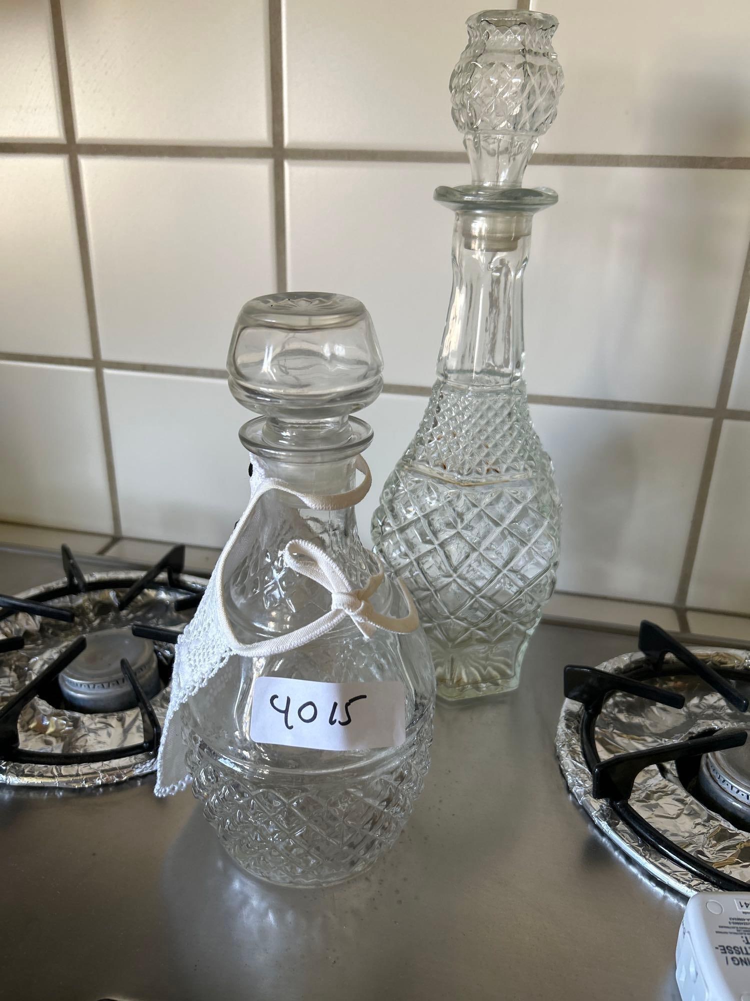 Two Mid-Century Glass Decanters: Two mid-century glass decanters.