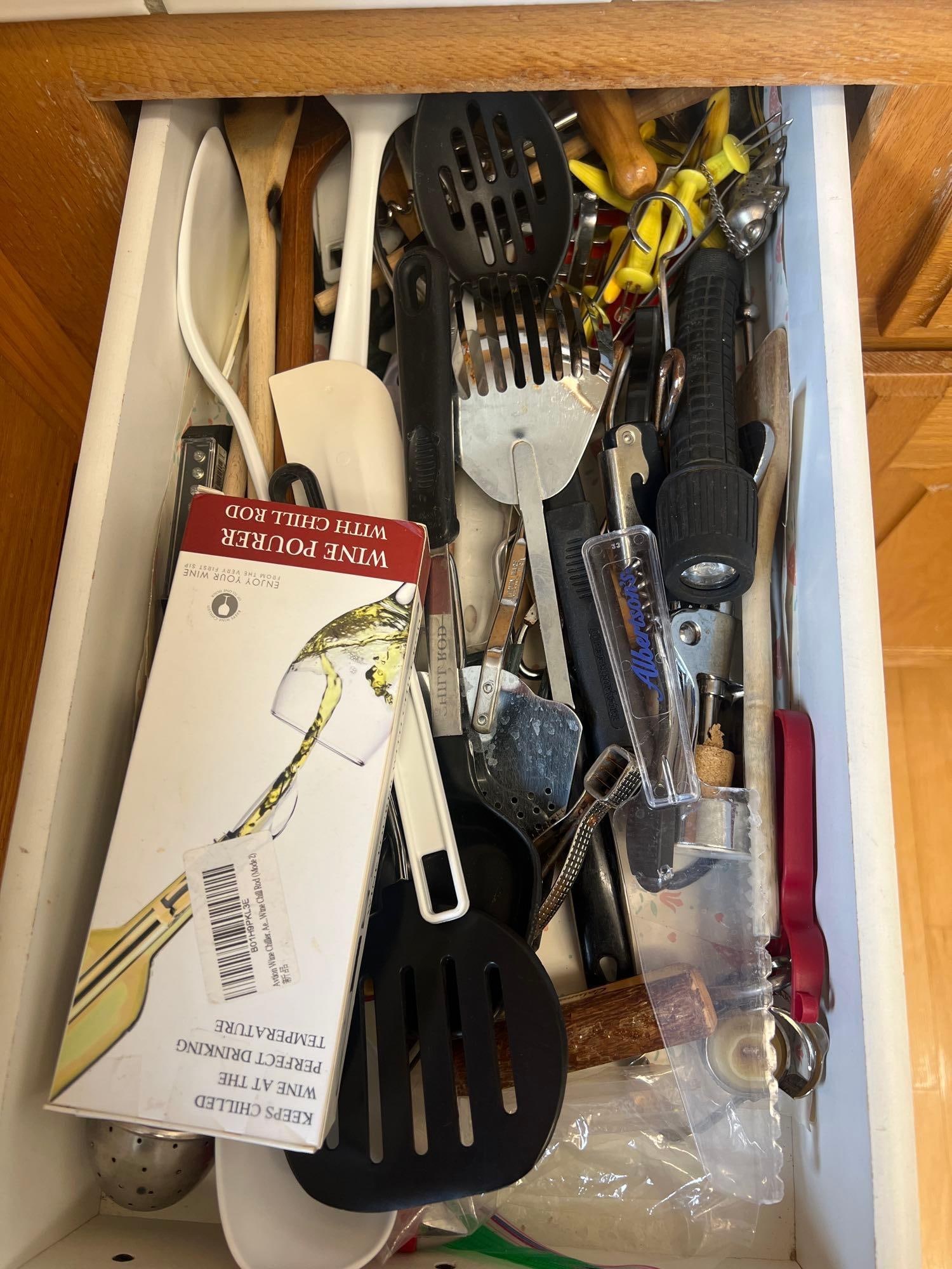 Drawer Of Miscellaneous Kitchenware: Drawer of miscellaneous kitchenware.