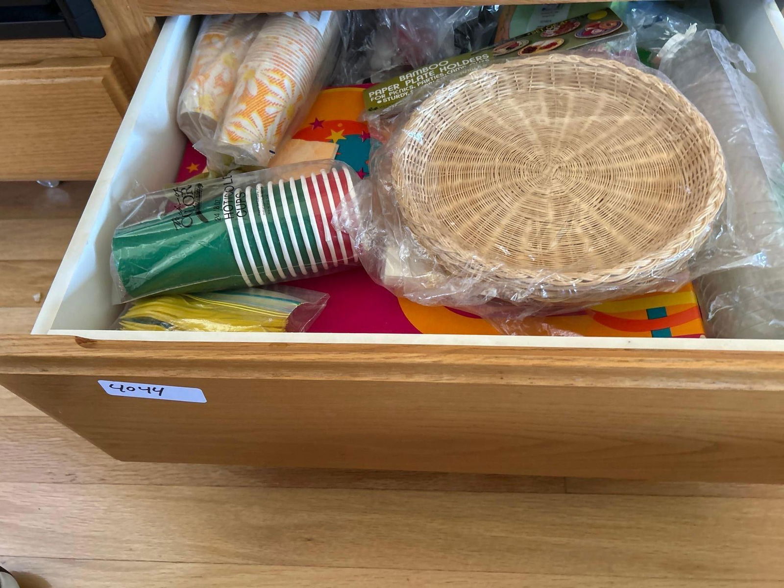 Drawer Of Paper Goods And Party Supplies: Drawer of paper goods and party supplies.