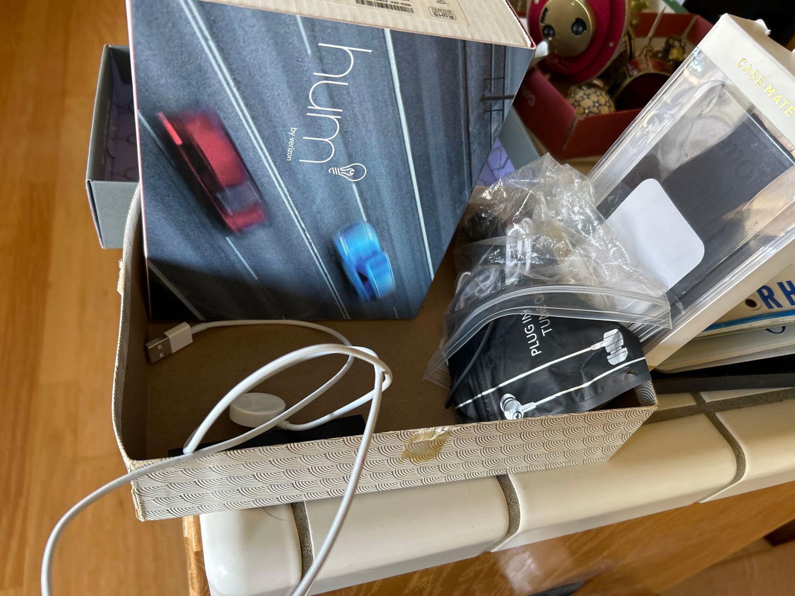 Lot Of Electronics To Include Verizon Hum, Apple Watch Charger, Earphones, And More: Lot of electronics to include Verizon hum, Apple Watch charger, earphones, and more.