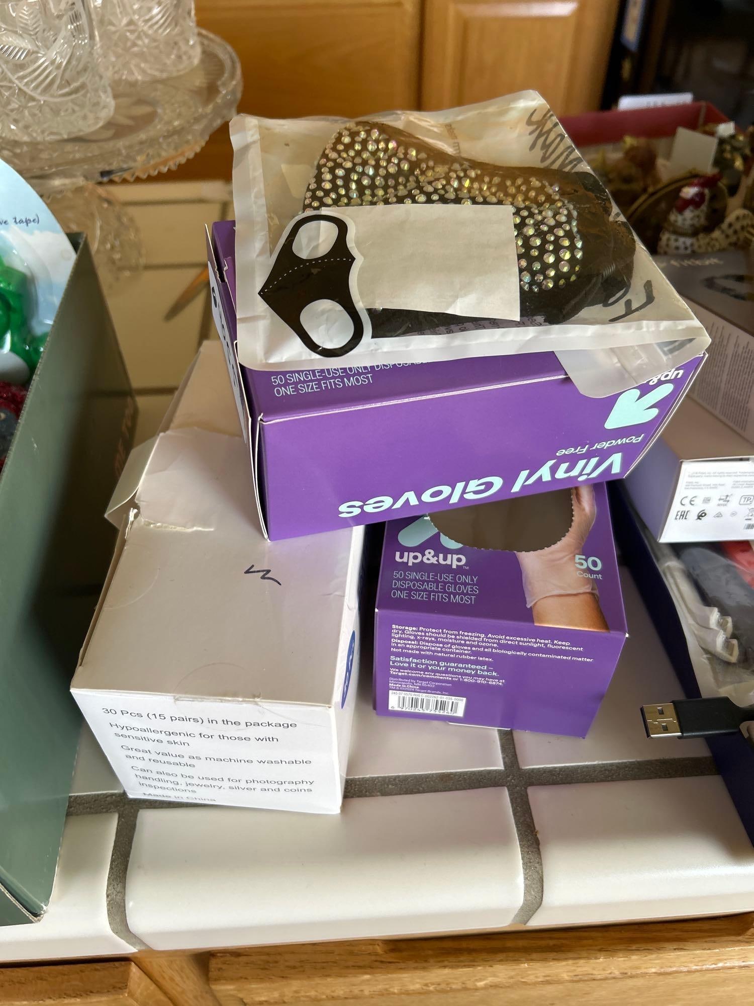 Vinyl Gloves And Mask: Vinyl gloves and mask.