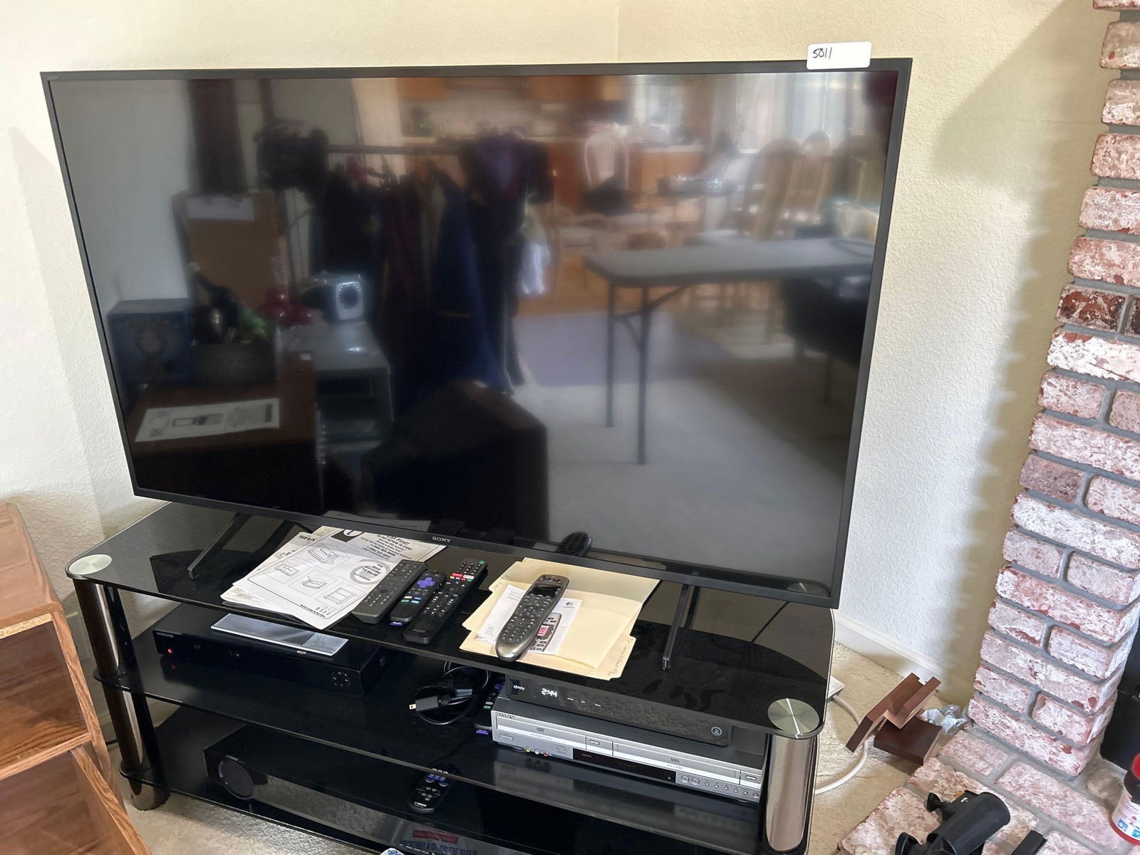 Sony Television With Console, Samsung Dvd Player, Yamaha Air Surround Xtreme Sound System, And Sony (1 of 2)