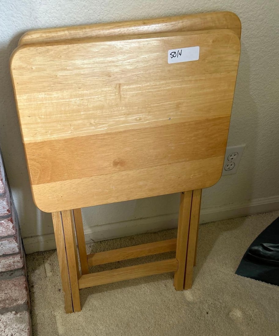 Two Folding Wood Tv Trays: Two folding wood TV trays.