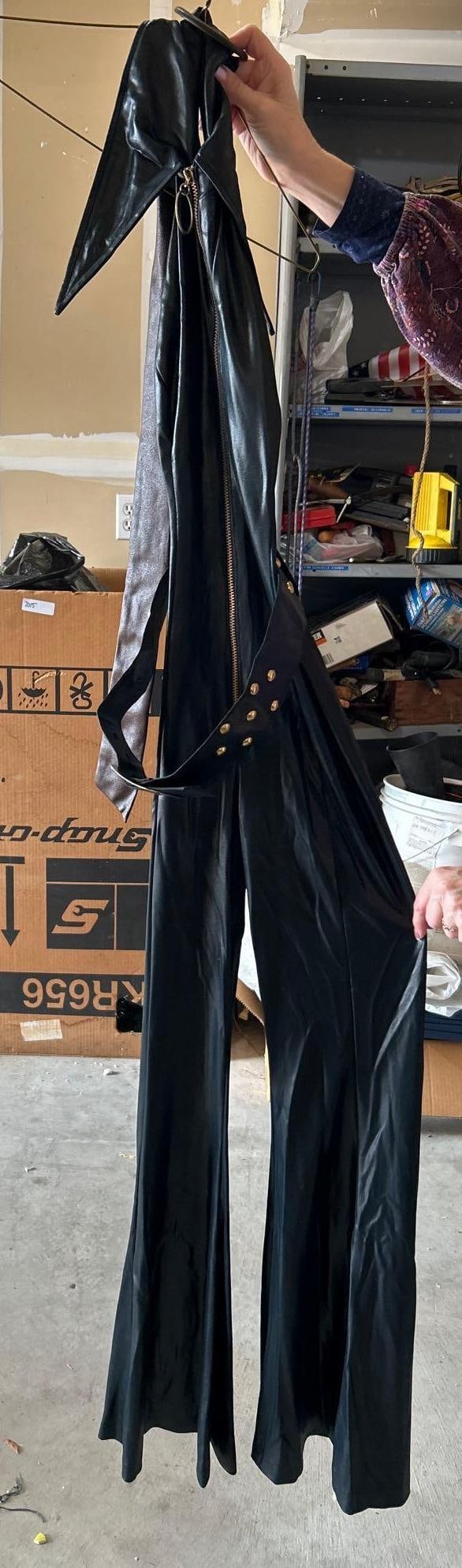 Two Vintage Disco Era Faux Leather Bell Bottom Jumpsuits: Two vintage disco era faux leather bell bottom jumpsuits. Approximate size extra small.