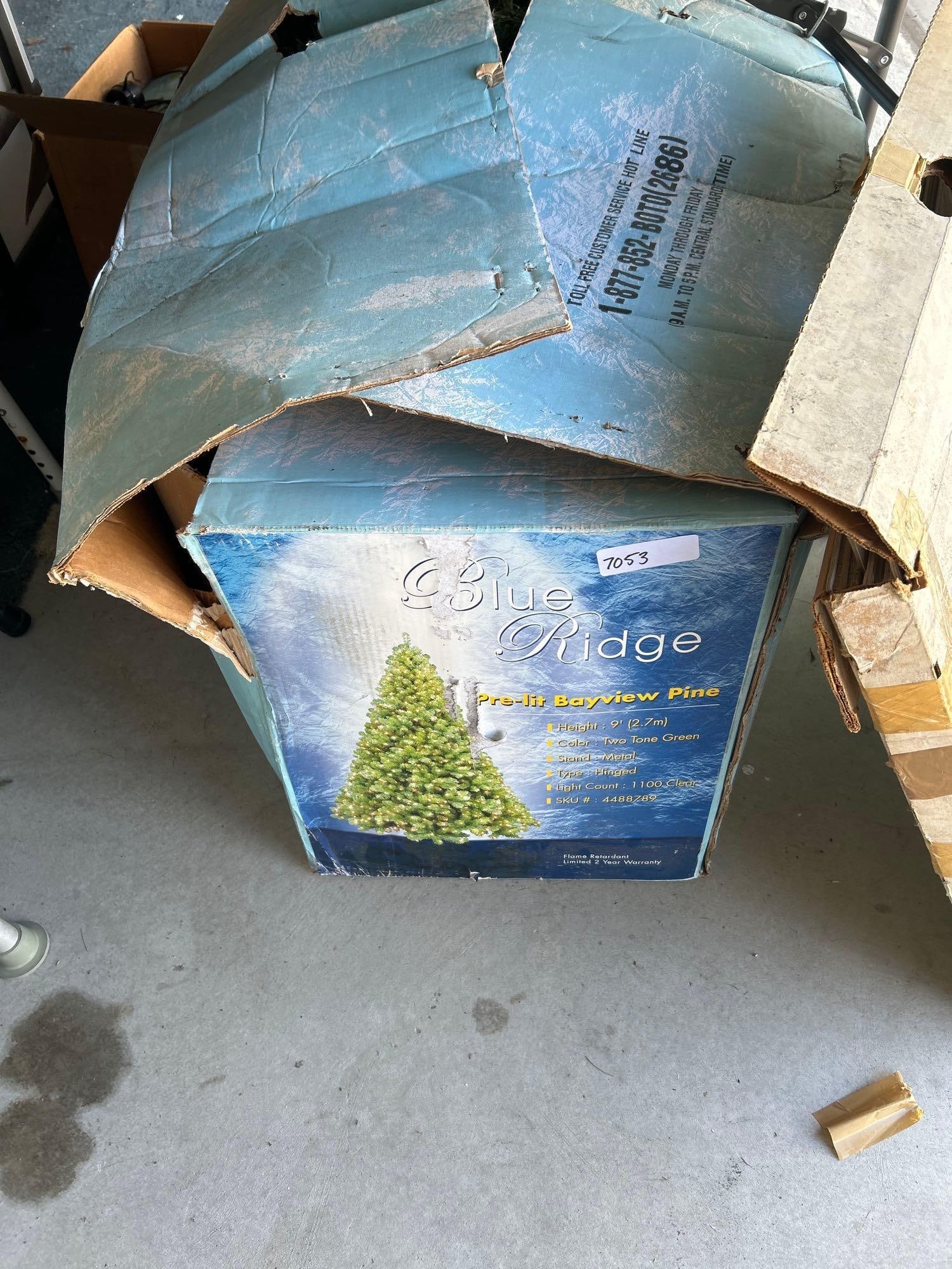 Blue Ridge Artificial 9 Foot Christmas Tree: Blue ridge artificial 9 foot Christmas tree. Has not been assembled.