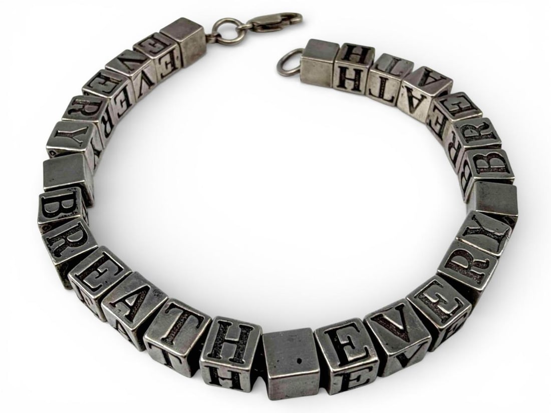 Sterling Silver "Every Breath" Block Letter Bracelet: Sterling Silver "Every Breath" Block Letter Bracelet, 27.2g. Marked "925." Length approximately 7.375 in. Width approximately 5.3mm. Provenance: From the private collection of Joel Rothschild.