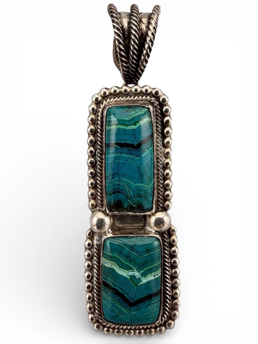 Navajo Sterling Silver River Turquoise Pendant: Navajo Sterling Silver River Turquoise Pendant, 44.3g. Marked "Sterling." Signed "Martinez Navajo." Pendant (including bale) approximately 3.625L x 1.0W in. Lower turquoise piece approximately 23.0 x