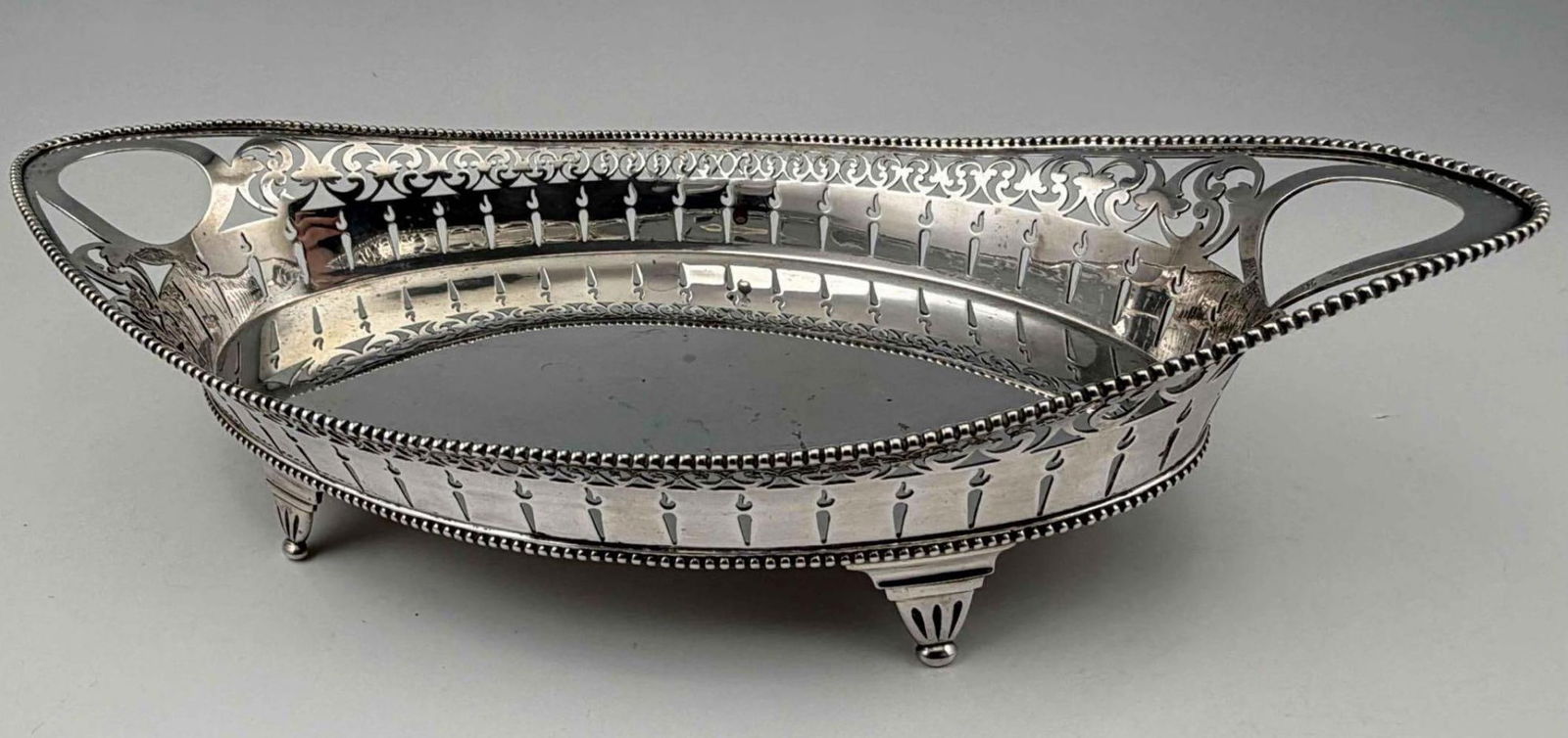Dutch Sterling Silver Footed Tray: Dutch Sterling Silver Footed Celery Tray, 376.0g. Marked with lion rampant, tests as 934 silver. Maker's mark "I.H.S." Marks for Amsterdam, date letter "S" for 1852. Approximately 11.1875L x 5.0W x